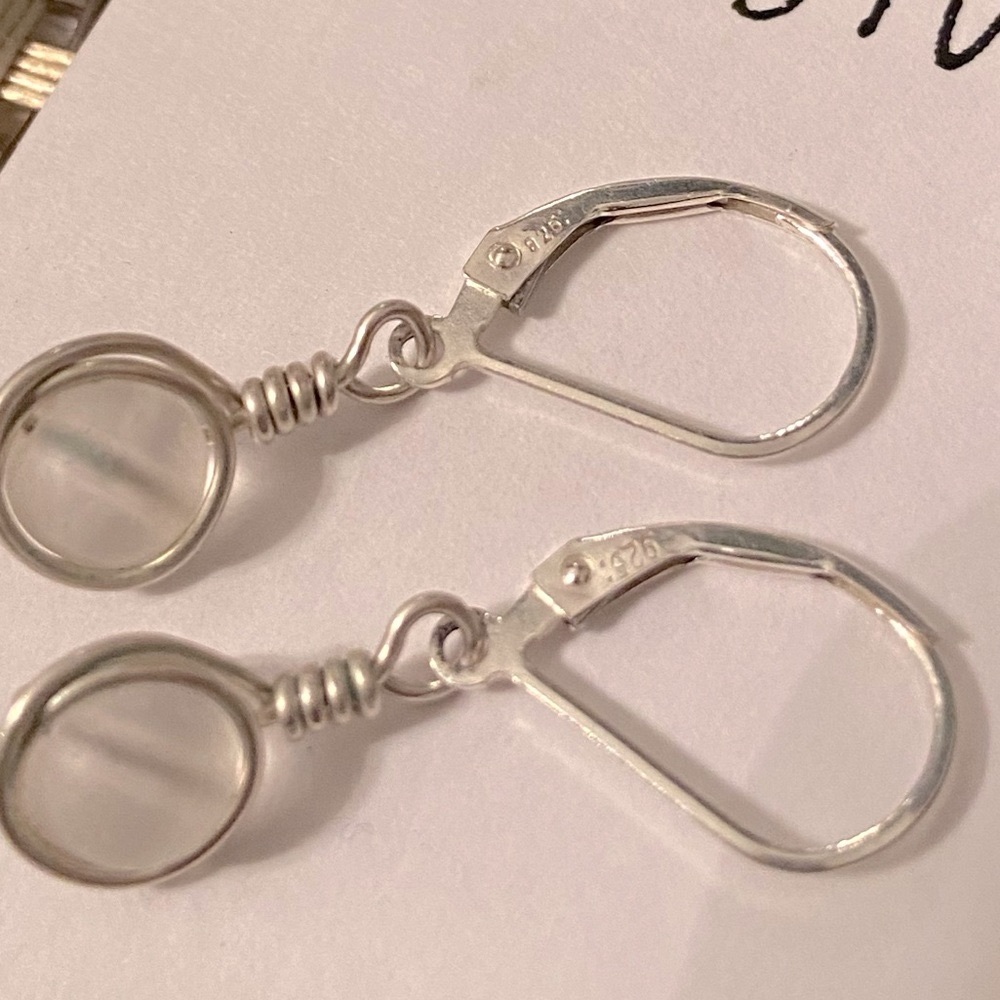 NWT Sea glass earrings with sterling silver material.